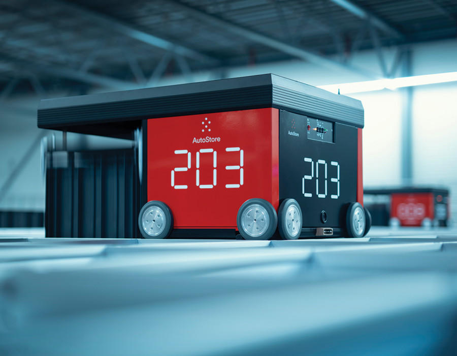 6130b4c8808b658e65e9265d AutoStore Warehouse Robot picking up a bin